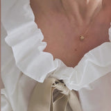 Blusa bianca fiocco